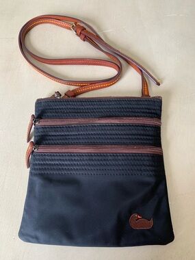 Dooney & Bourke North South Triple Zip Nylon Crossbody Bag.
